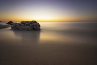The sun rises on the Costa Rei, a stretch of coastline on the Italian Mediterranean island of