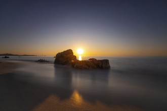The sun rises on the Costa Rei, a stretch of coastline on the Italian Mediterranean island of
