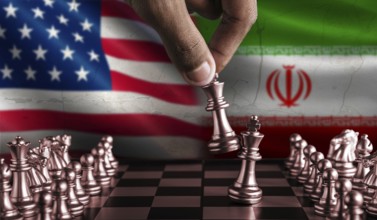 Political tension between USA and Iran. Iran vs USA flag on chessboard. Iran territory conflict