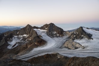 High mountain landscape at sunrise, glacier and rocky mountain peaks, view of the Königshofspitz