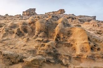 A rocky area with a hole in the ground. Rabat, Morocco