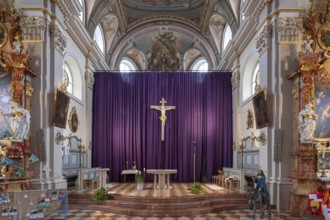 Large purple Lenten cloth in front of the high altar in the baroque parish church of St Nicholas,