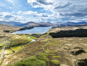 Mountains and Moors over Loch Tulla and River Orchy from a drone, Highlands, Scotland, UK