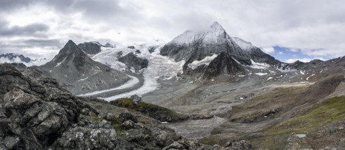 Mountain hut Cabane des Dix in front of glacier Glacier de Cheilon and summit Mont Blanc de