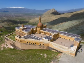 Large fortress in a mountainous landscape with a dome and expansive views, aerial view, Ishak Pasha