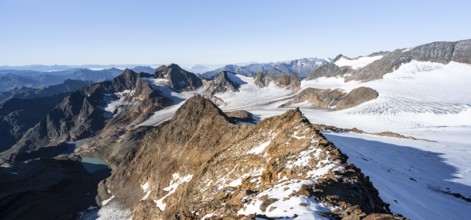 Rocky ridge on the Wilder Freiger mountain peak, behind Signal summit and Becher summit with