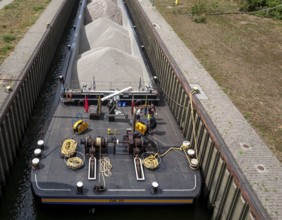 Barges in the Edersheim lock near Hattersheim, Hesse, Germany