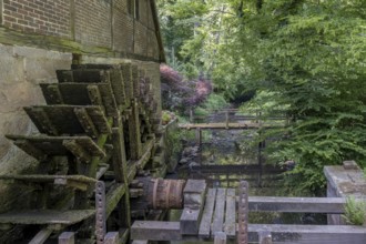 Mill wheel of an old watermill, Welbergen, Münsterland, North Rhine-Westphalia, Germany