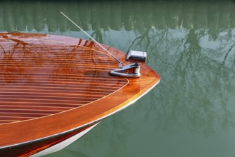 Radio antenna on motorboat, water taxi, taxi boat on waterway, canal, view from above, detail,