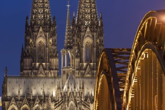Cologne Cathedral and the Hohenzollern Bridge illuminated with LED lights, Cologne, North