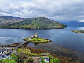 Eilean Donan Castle and Loch Duich from a drone, Isle of Skye, Highlands, Scotland, England, United