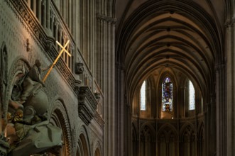 Interior view, angel on pulpit, holding a shining golden sword, Cathédrale Notre-Dame de Bayeux,