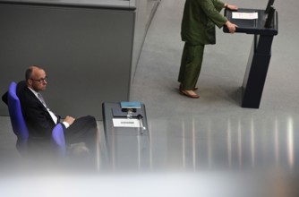 Federal Chancellor Friedrich Merz (CDU) and parts of his cabinet sit on the government bench,