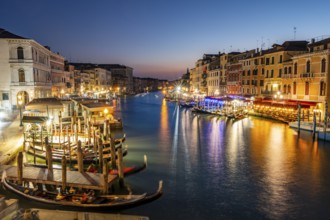 View of the Grand Canal at the blue hour, picturesque evening mood with illuminated palazzos on the