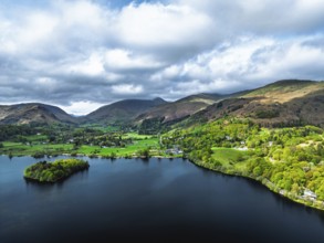 Farms and Mountains over road A591 from a drone, Grasmere Lake, Grasmere, Ambleside, Lake District,