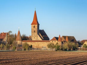 The medieval fortified church of St. George in the district of Kraftshof, Nuremberg, Middle