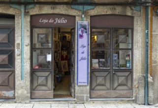 Door and shop window of Loja do Julio secondhand bookshop, Guimaraes, Portugal