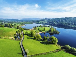 Farms over Esthwaite Water from drone, Lake District National Park, Cumbria, UK