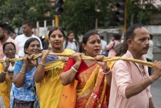 Hindu devotees takes part in Rath Yatra religious procession Guwahati, India on June 27, 2025. Rath