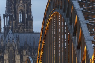 Cologne Cathedral and the Hohenzollern Bridge illuminated with LED lights, Cologne, North
