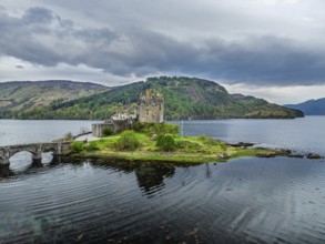 Eilean Donan Castle and Loch Duich from a drone, Isle of Skye, Highlands, Scotland, England, United