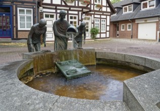 The asparagus fountain in Mühlenstraße, a historical sight in the old town centre of Nienburg an