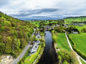 Farms and mountains over Ullswater Lake from drone, Pooley Bridge, Lake District National Park,