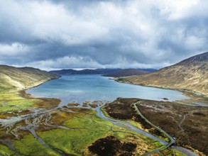 View from Eas a' Bhradain Waterfall from drone, Red Cuillin mountains, Loch Ainort, Isle of Skye,