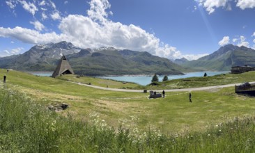 Panoramic view from plateau above Lanslebourg-Mont-Cenis to reservoir Lac du Mont Cenis left Museum
