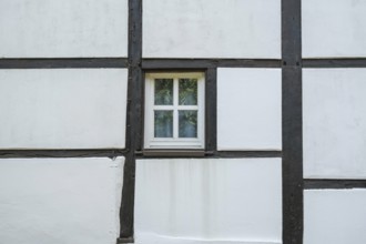Stable window in a half-timbered barn, Münsterland, North Rhine-Westphalia, Germany