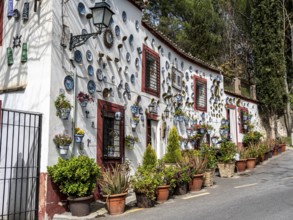 House casa la sevillana, decorated white house, Granada, Andalusia, Spain