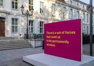 Tony Cokes, visual artist and educator, display panel at the Palais Populaire Unter den Linden,