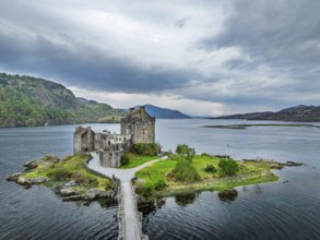 Eilean Donan Castle and Loch Duich from a drone, Isle of Skye, Highlands, Scotland, England, United