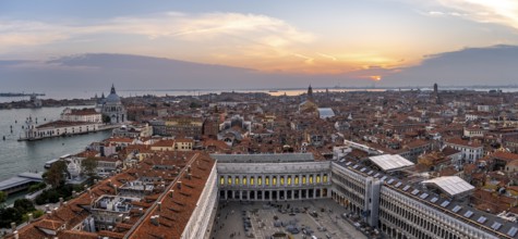 Panorama, St Mark's Square and Basilica di Santa Maria della Salute on the Grand Canal at sunset,