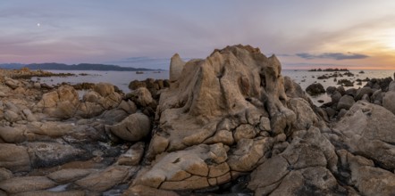 Sunset, rocky coast near Porto Pollo, Corsica, France