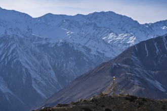 View of the Himalayan mountains, Buddhist prayer flags in the foreground, Himalayas, Hangrang,