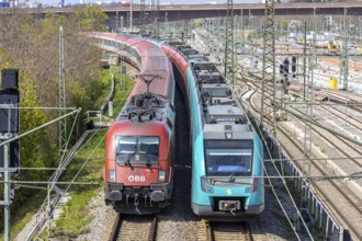 S-Bahn and EuroCity train of ÖBB Austrian Federal Railways in Stuttgart Untertürkheim, Germany