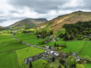 Farms and Mountains over road A591 from a drone, Grasmere Lake, Grasmere, Ambleside, Lake District,