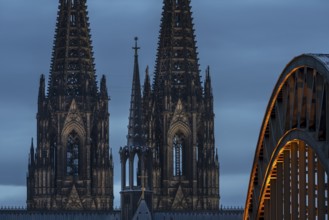 Cologne Cathedral and the Hohenzollern Bridge illuminated with LED lights, Cologne, North