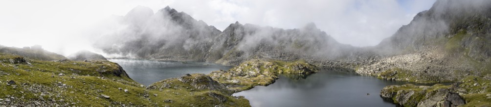 Mountain lakes Wangenitzsee and Kreuzsee, cloudy mountain peaks in the morning, Schober group, Hohe