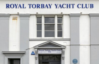 Royal Torbay Yacht Club sign on building, Torquay, Devon, England, UK