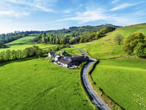 Farms over Esthwaite Water from drone, Lake District National Park, Cumbria, UK