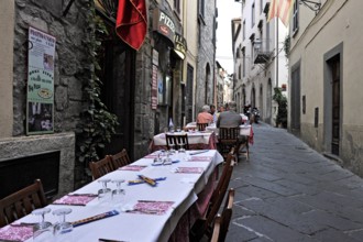 Covered tables, narrow alley with pizzeria, alleyway restaurant, Via San Giovanni, historic centre,