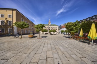 Square, historic town hall, trees, general architecture, outdoor area of a restaurant with