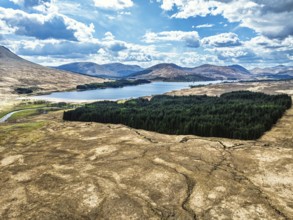 Mountains and Moors over Loch Tulla and River Orchy from a drone, Highlands, Scotland, UK