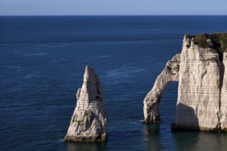 Rock arch Falaise or Porte d'Aval and rock needle Aiguille, Étretat, sea, steep coast, cliffs,