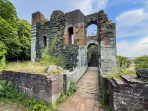 View from the location of the northern tower over a small bridge to the ruins of the imperial
