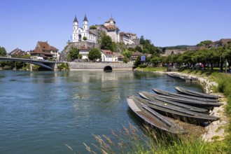 Aarburg town on the River Aare with church, fortress and boats in Aarburg, Switzerland