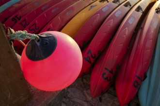 Kayaks, boats, colourful, lying on the beach, buoy, Étretat, Normandy, Seine-Maritime, France