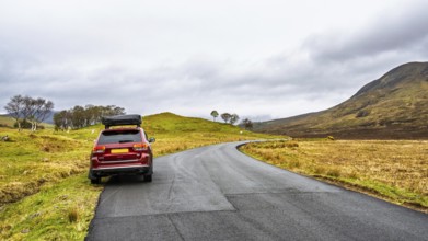 Off road 4x4 car with tent roof on Isle of Sky, Scotland, UK